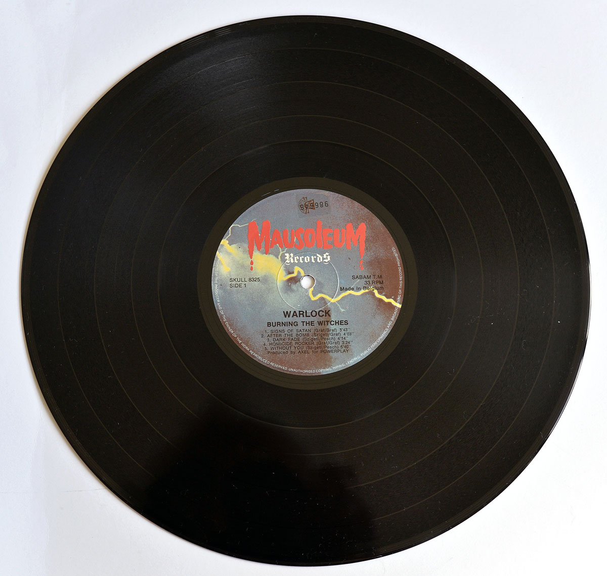 Close up of Side One label for WARLOCK Burning the Witches